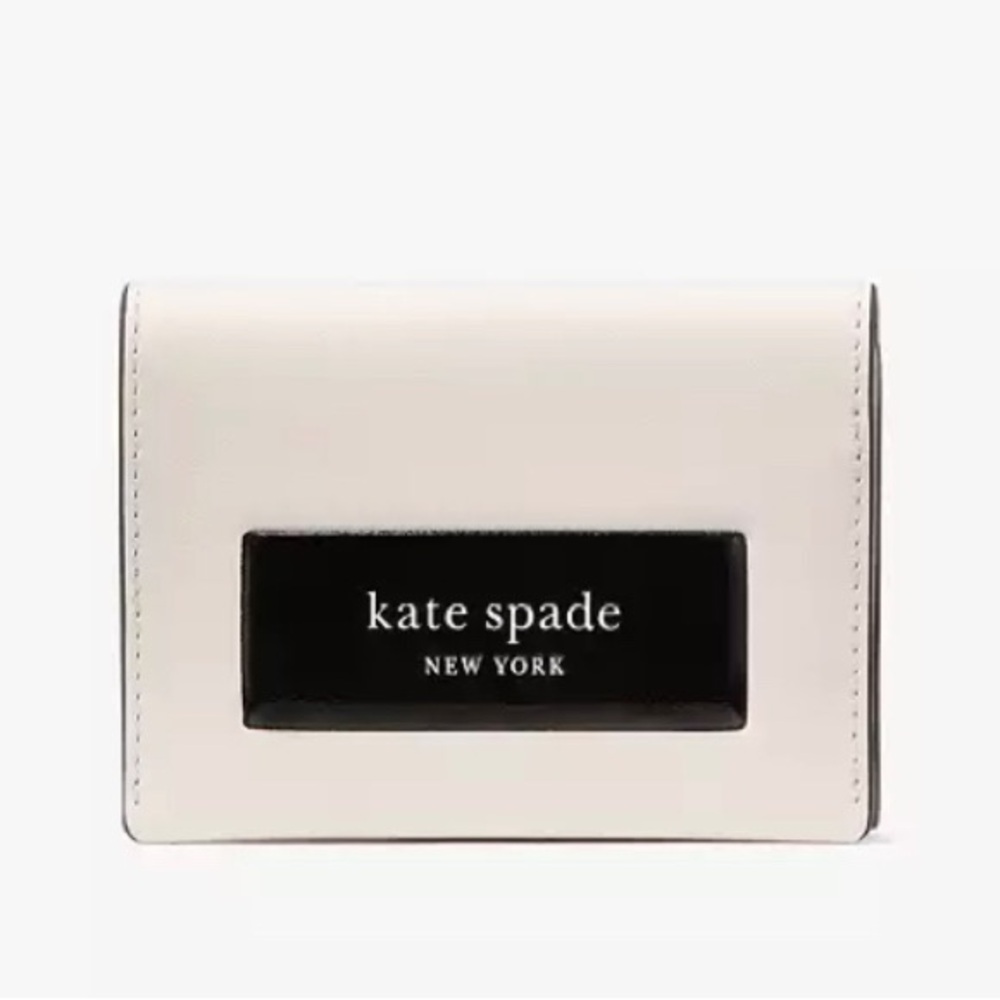 Kate Spade Cream Trifold wallet with Black and Green Accent